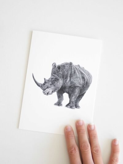 This rhino greeting card is made from Kelowna-based artist Jennifer Delaney. Its minimalistic style makes it good for an occasion including birthdays, holidays, Christmas, and weddings! It features art made with pen and marker.