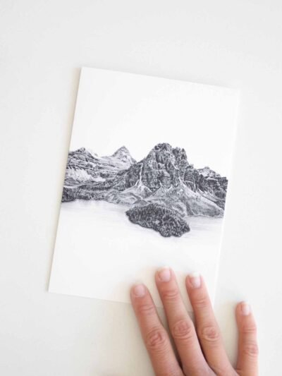 This Mount Assiniboine greeting card is made from Kelowna-based artist Jennifer Delaney. Its minimalistic style makes it good for an occasion including birthdays, holidays, Christmas, and weddings! It features art made with pen and marker.