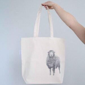 Sheep tote bag featuring an ink sketch by Kelowna based artist Jennifer Delaney. Handmade, minimalistic, and ethical.