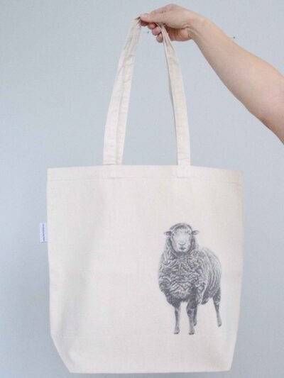 Sheep tote bag featuring an ink sketch by Kelowna based artist Jennifer Delaney. Handmade, minimalistic, and ethical.