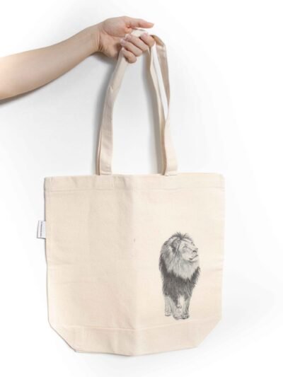 Lion tote bag featuring an ink sketch by Kelowna based artist Jennifer Delaney. Handmade, minimalistic, and ethical.